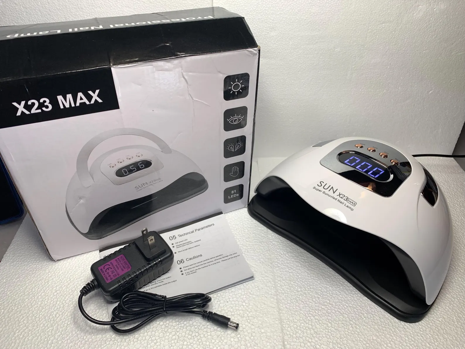 دستگاه لاک خشککن یووی الایدی سان مدل SUN X23 MAX توان ۳۸۰ وات با ۸۱ لامپ LED و دسته حمل
